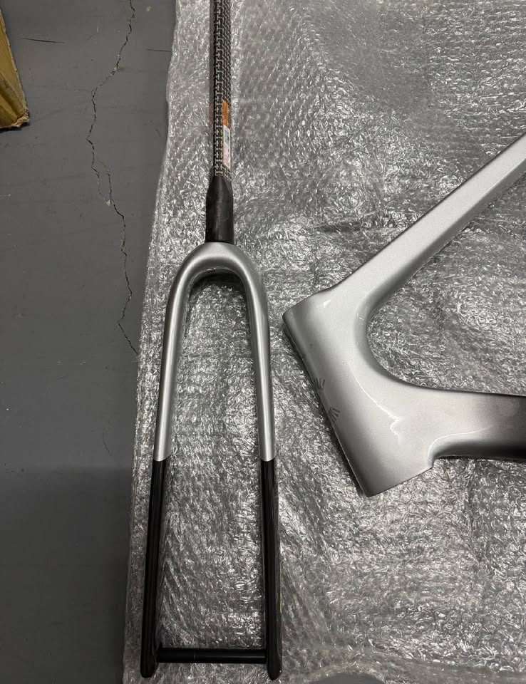 Matte black Cannondale SuperSix EVO Hi-MOD frame and fork with a silver fade on the top tube, laid on bubble wrap, from the seller's Marketplace listing. Photo 2 of 5.