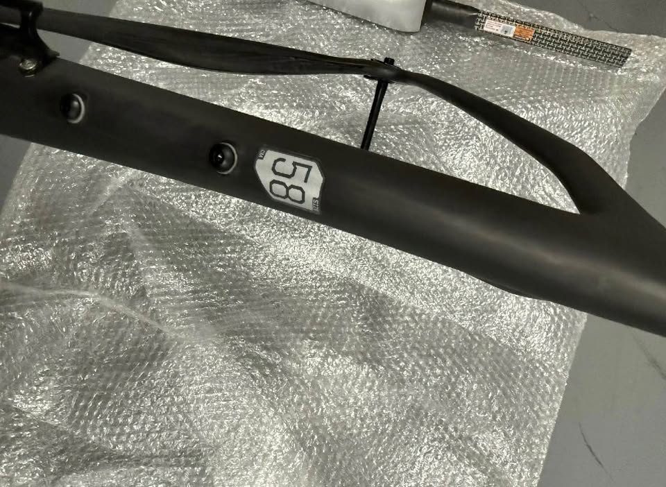 Matte black Cannondale SuperSix EVO Hi-MOD frame and fork with a silver fade on the top tube, laid on bubble wrap, from the seller's Marketplace listing. Photo 3 of 5.
