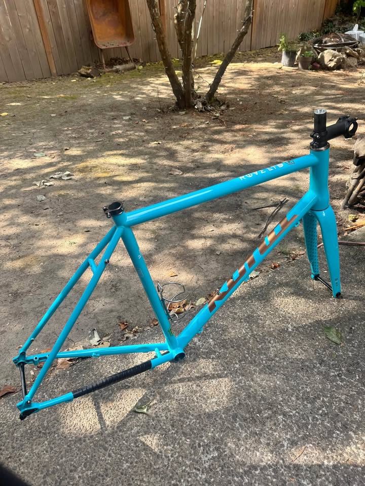 Kona Rove LTD frameset in turquoise with its carbon fork, from the seller's Marketplace listing.