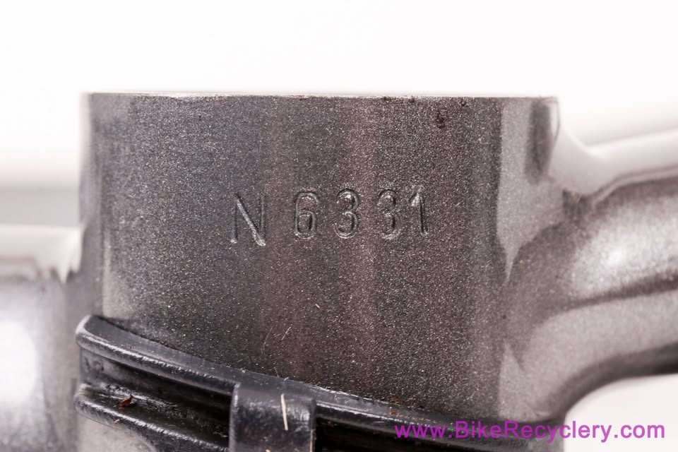 Mark Nobilette steel frame in metallic dark grey with a black carbon fork, on a white background, from Bike Recyclery's Marketplace listing. Photo 10 of 10.