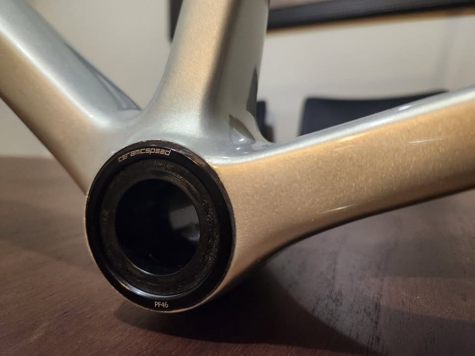 Silver OPEN MIN.D carbon frameset standing on a dining table with its fork, an ENVE stem and a seatpost topper fitted, from the seller's Marketplace listing. Photo 5 of 9.