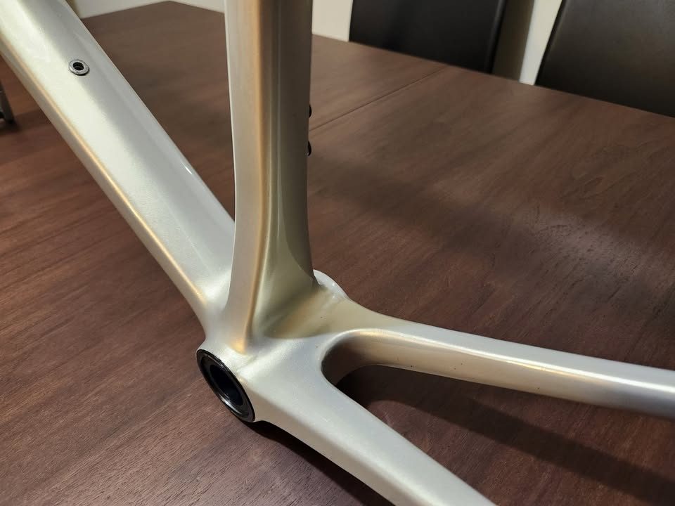 Silver OPEN MIN.D carbon frameset standing on a dining table with its fork, an ENVE stem and a seatpost topper fitted, from the seller's Marketplace listing. Photo 6 of 9.
