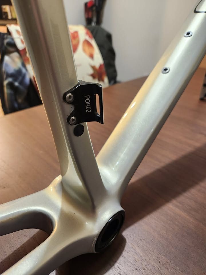 Silver OPEN MIN.D carbon frameset standing on a dining table with its fork, an ENVE stem and a seatpost topper fitted, from the seller's Marketplace listing. Photo 9 of 9.