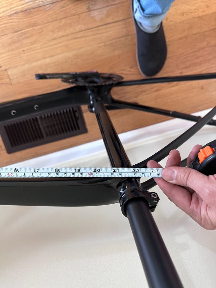 Black Orbea Terra carbon frame and fork with a Rotor crankset fitted and a handlebar and stem on the fork, standing on a wood floor, from the seller's Marketplace listing. Photo 10 of 10.