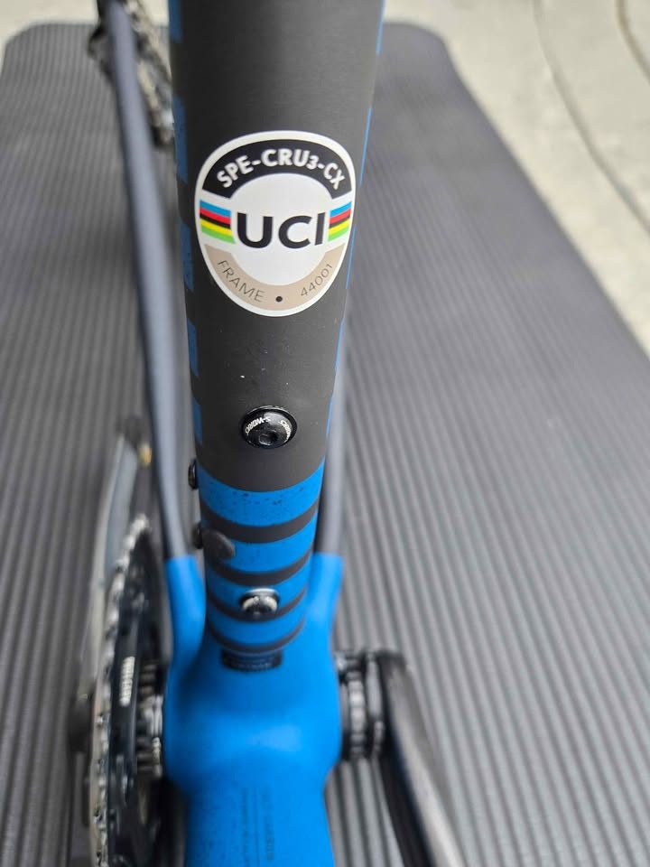 Rear triangle of a matte black S-Works Crux frame with blue speckles, a silver flat mount disc caliper bolted to the chainstay, from the seller's Marketplace listing. Photo 3 of 6.